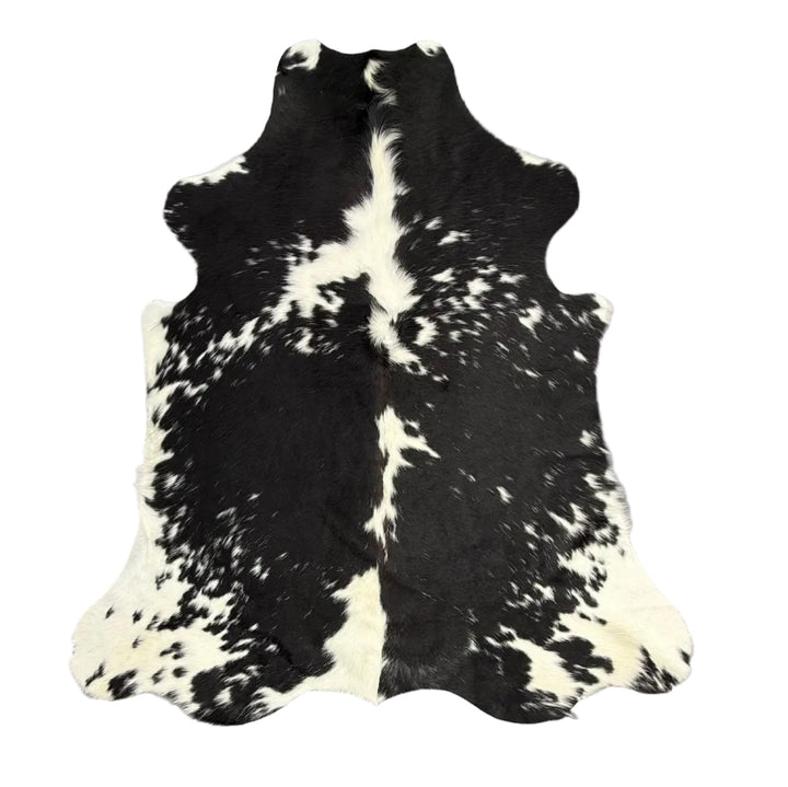 Premium cowhide rug by Cowhide Rugs London, 185cm x 154cm, featuring natural cowhide texture and distinctive pattern.