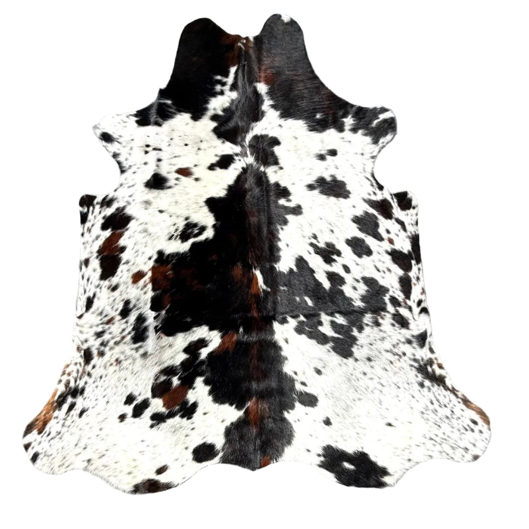 A natural black and white cowhide rug 