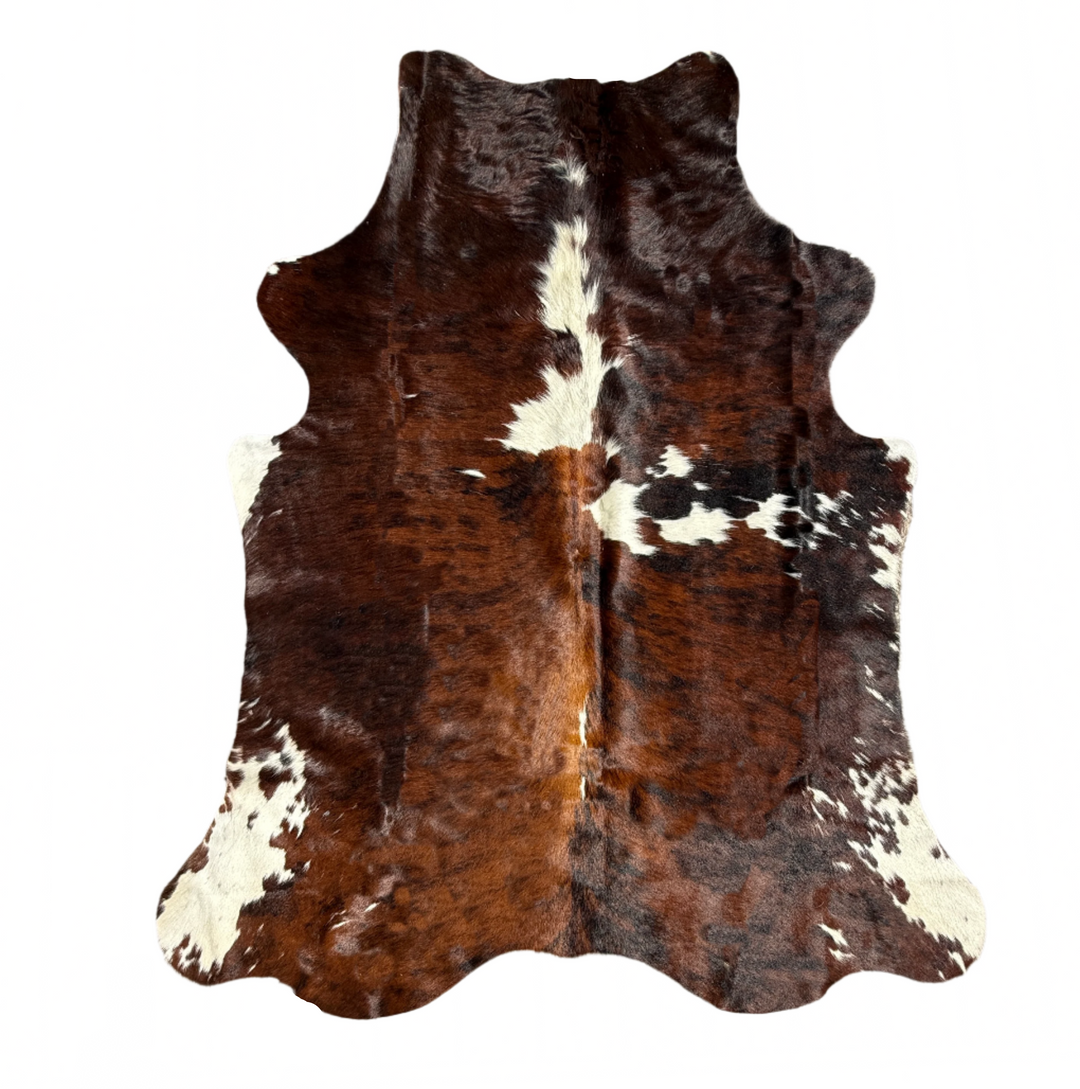 Black Brown and white cowhide rug I living room