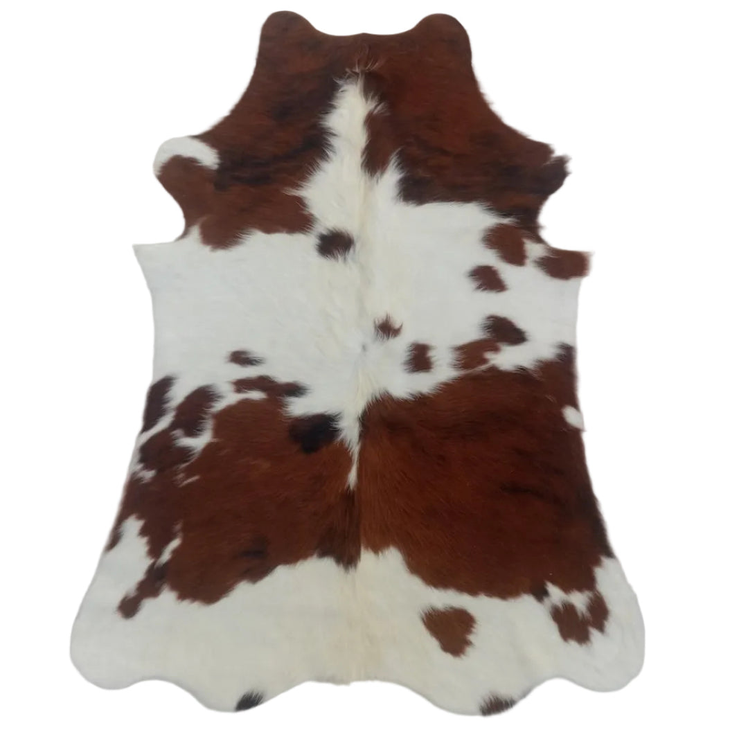 Brown and white cowhide rug o