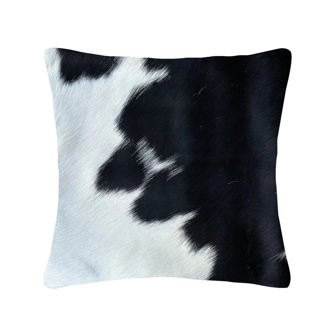 Cowhide cushion from Cowhide Rugs London, 39cm x 39cm, featuring natural cowhide with a unique pattern and texture.