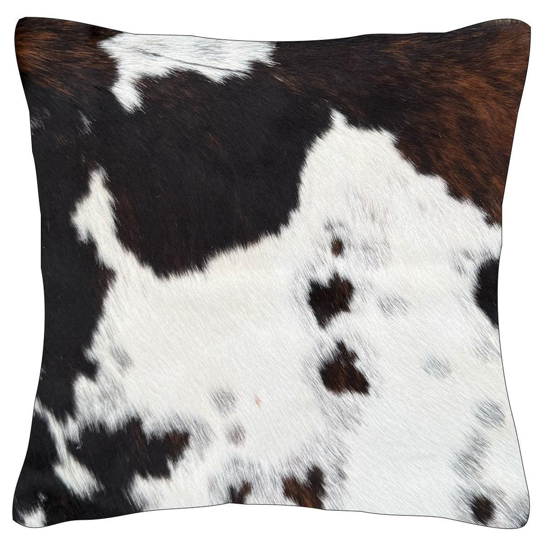 Cowhide cushion from Cowhide Rugs London, 39cm x 39cm, double-sided natural cowhide texture on a soft cushion.
