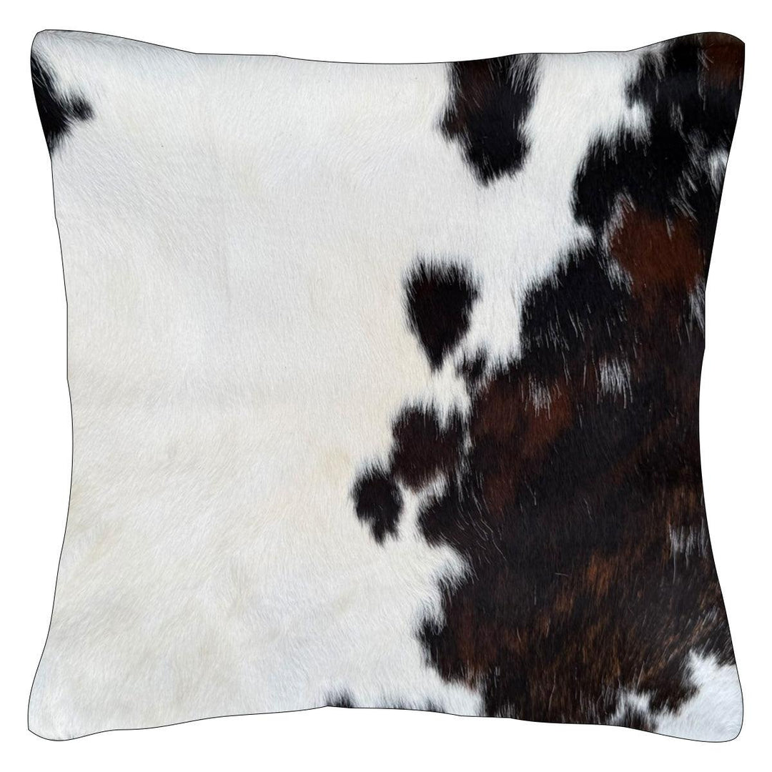 Cowhide cushion from Cowhide Rugs London, 39cm x 39cm, with natural cowhide pattern on both sides.