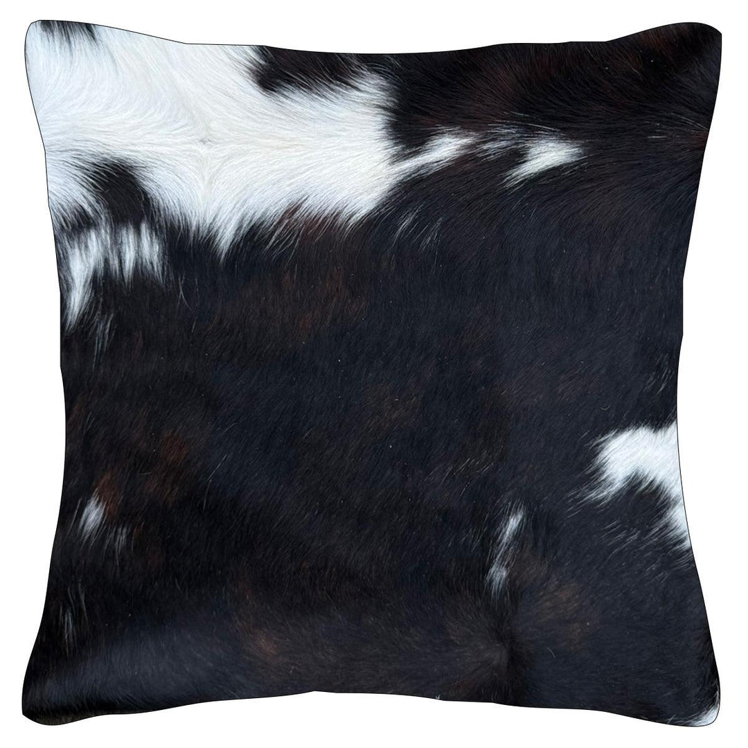 Cowhide cushion by Cowhide Rugs London with cowhide and suedette reverse, 39cm x 39cm, featuring natural textures and neutral tones.