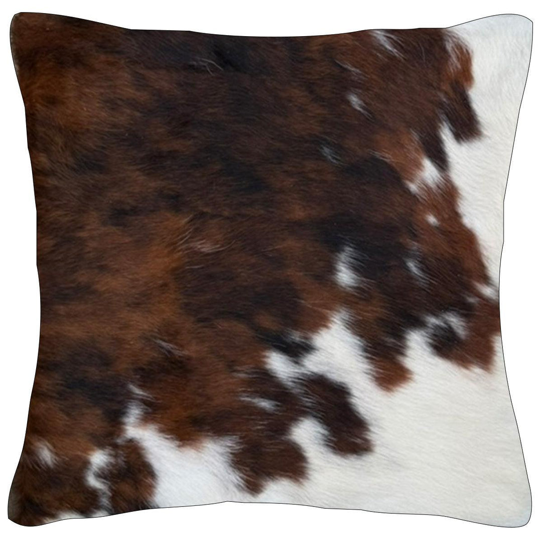 Cowhide cushion by Cowhide Rugs London featuring a cowhide front and suedette reverse, 39cm by 39cm, textured and stylish.