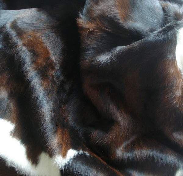 Cowhide Rug by Cowhide Rugs London, size 2.10m x 1.70m, showcasing natural cowhide pattern and texture.