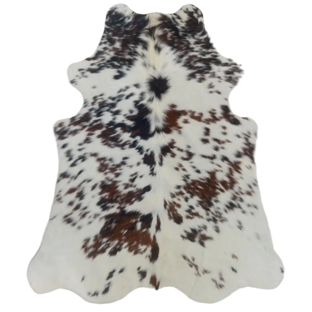 Premium cowhide rug from Cowhide Rugs London, 160cm x 125cm, natural cowhide with a black and white pattern.