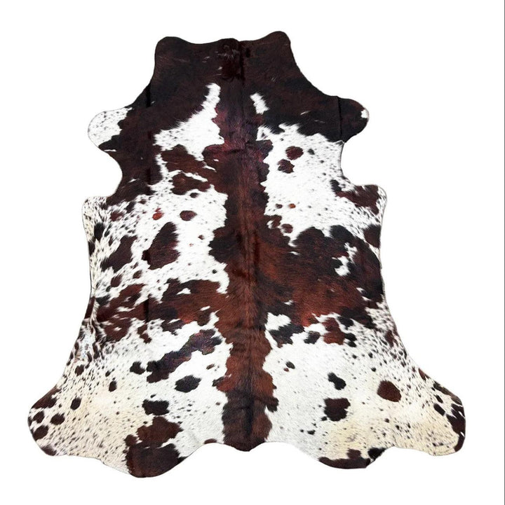 Premium cowhide rug from Cowhide Rugs London, 205cm by 180cm, featuring natural cowhide with unique patterns and rich texture.