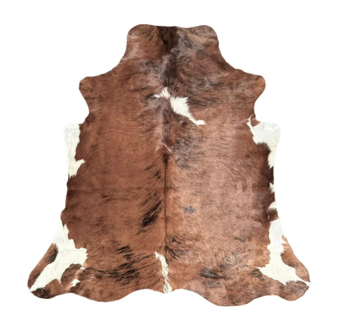 Premium Cowhide Rug DM434 from Cowhide Rugs London, natural cowhide with a 198cm x 175cm size, showcasing a soft, patterned hide.