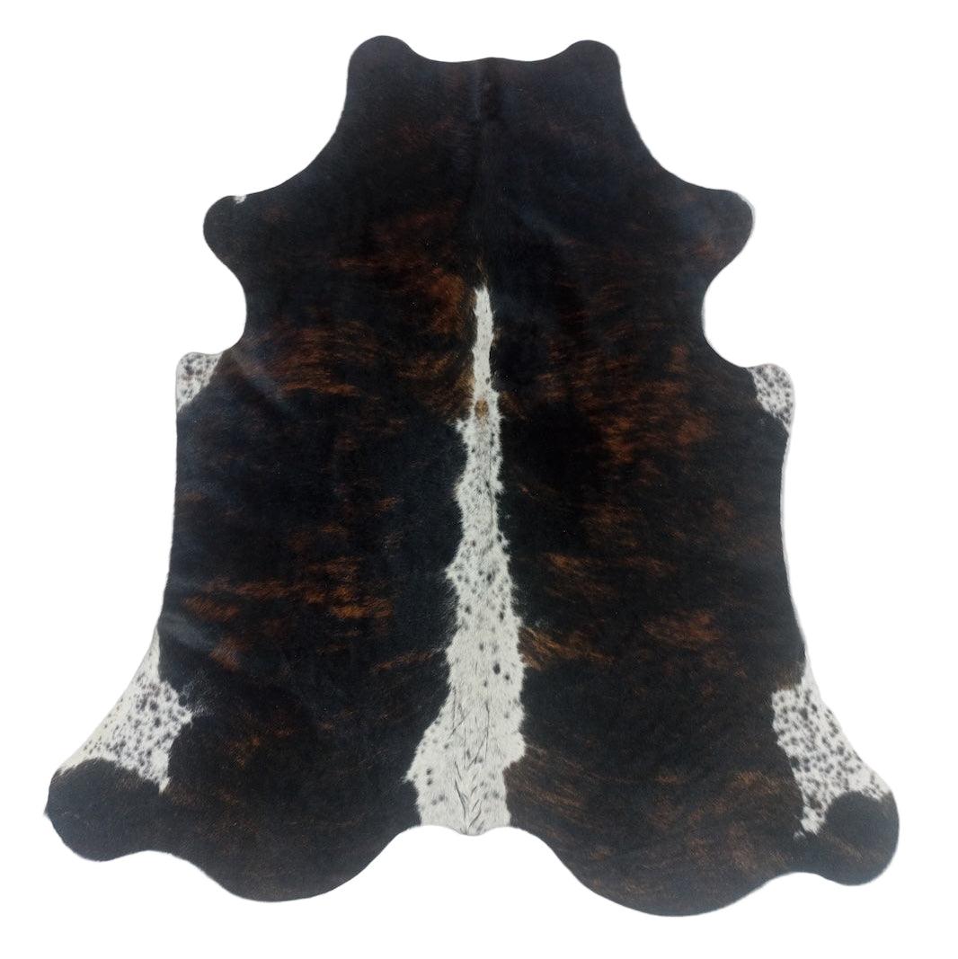 Premium cowhide rug from Cowhide Rugs London, 180cm x 161cm, natural cowhide with distinctive pattern and soft texture.