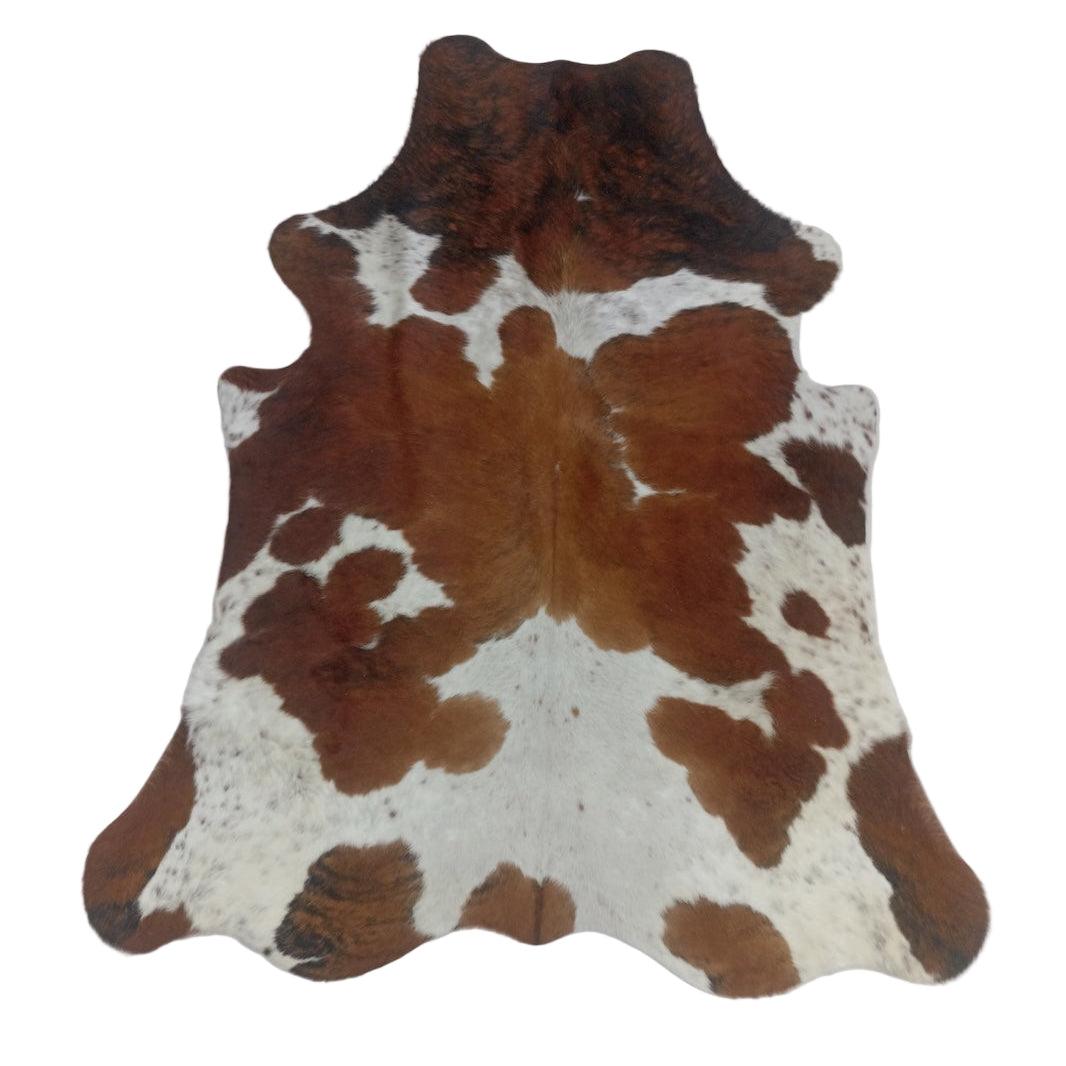 Premium cowhide rug from Cowhide Rugs London, 183cm x 155cm, natural cowhide with unique patterns and textures.