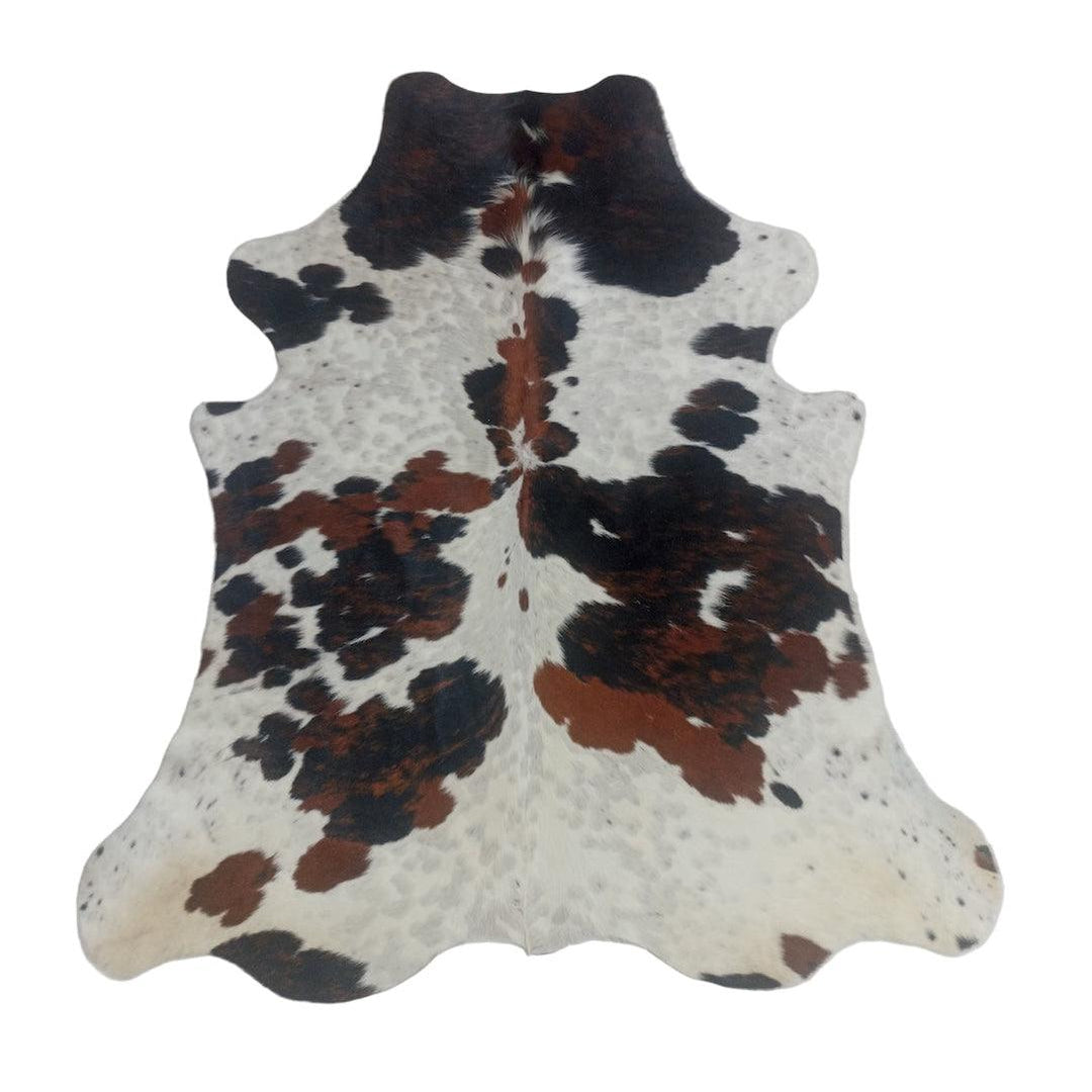 Premium cowhide rug by Cowhide Rugs London, 181cm x 160cm, natural cowhide pattern, small size for living spaces.
