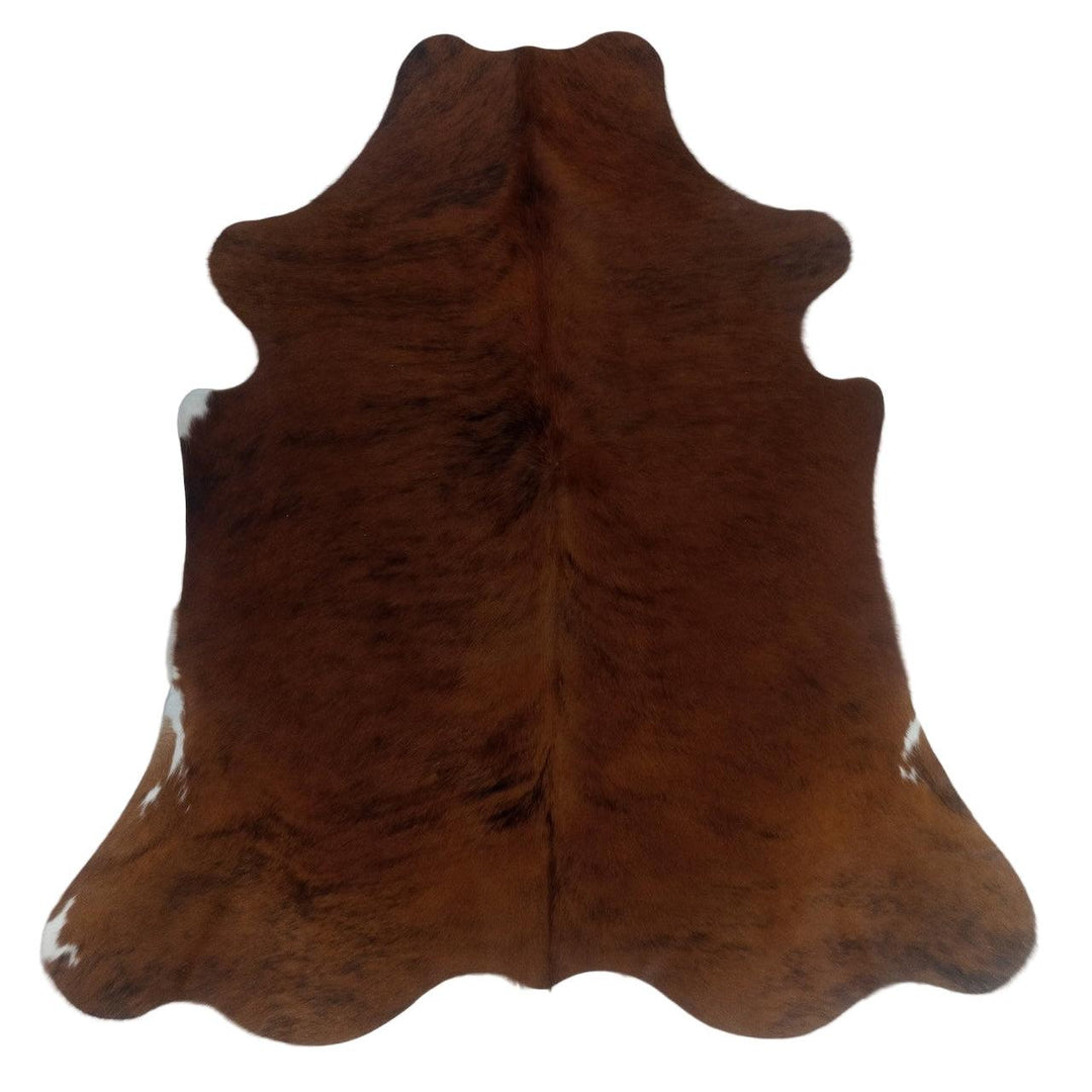 Premium cowhide rug by Cowhide Rugs London, 190cm x 167cm, natural medium-sized cowhide with distinctive markings.