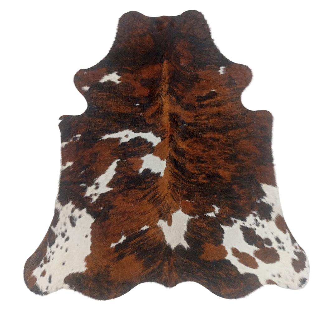 Premium cowhide rug from Cowhide Rugs London, 181cm x 158cm, natural cowhide pattern, small size, high-quality leather texture.