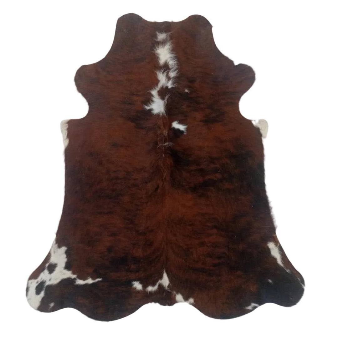 Premium cowhide rug from Cowhide Rugs London, 164cm x 140cm, natural cowhide with unique markings and soft texture.