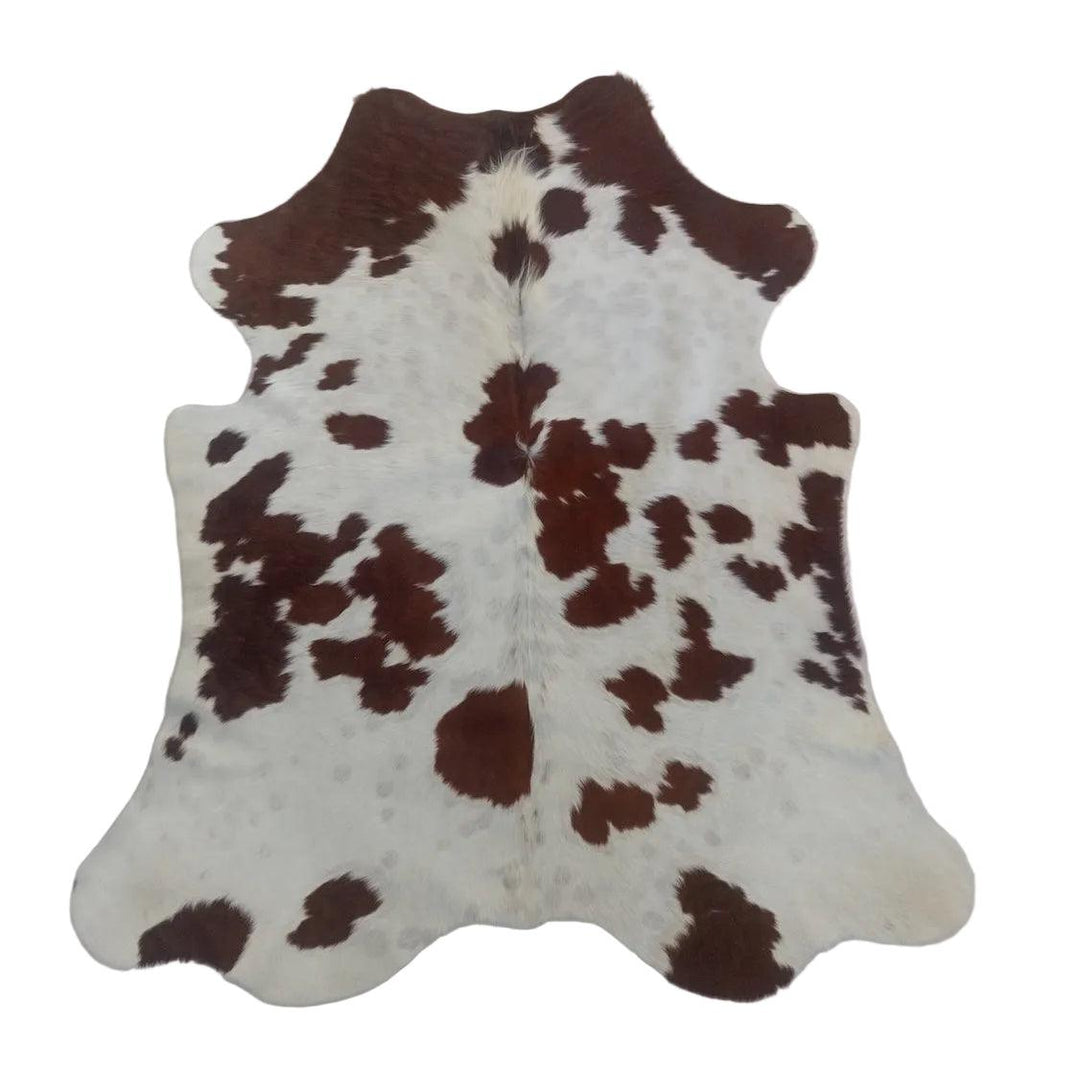 Premium cowhide rug from Cowhide Rugs London, 155cm x 147cm, featuring natural cowhide pattern and soft leather texture.