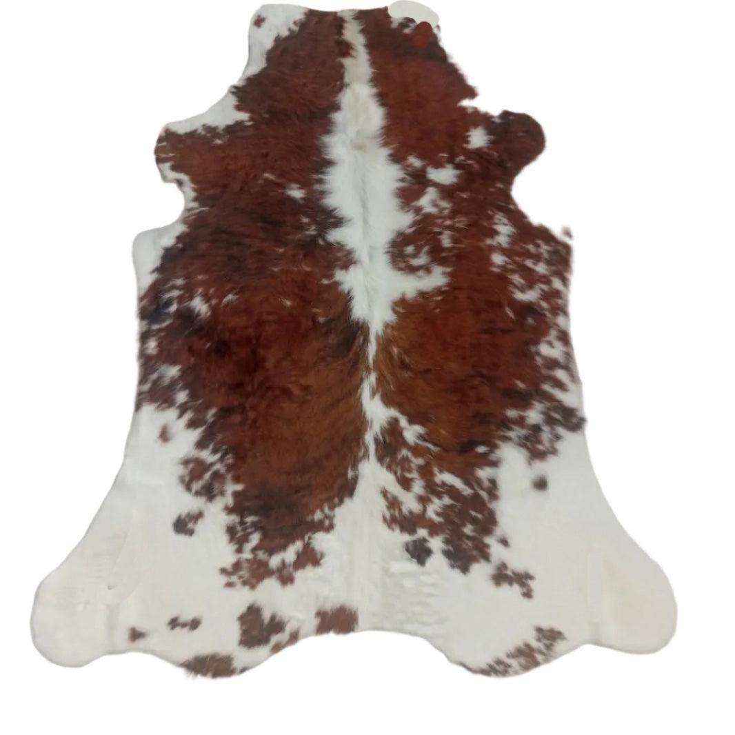 Premium Cowhide Rug from Cowhide Rugs London, 180cm x 153cm, natural cowhide with unique markings and smooth texture.
