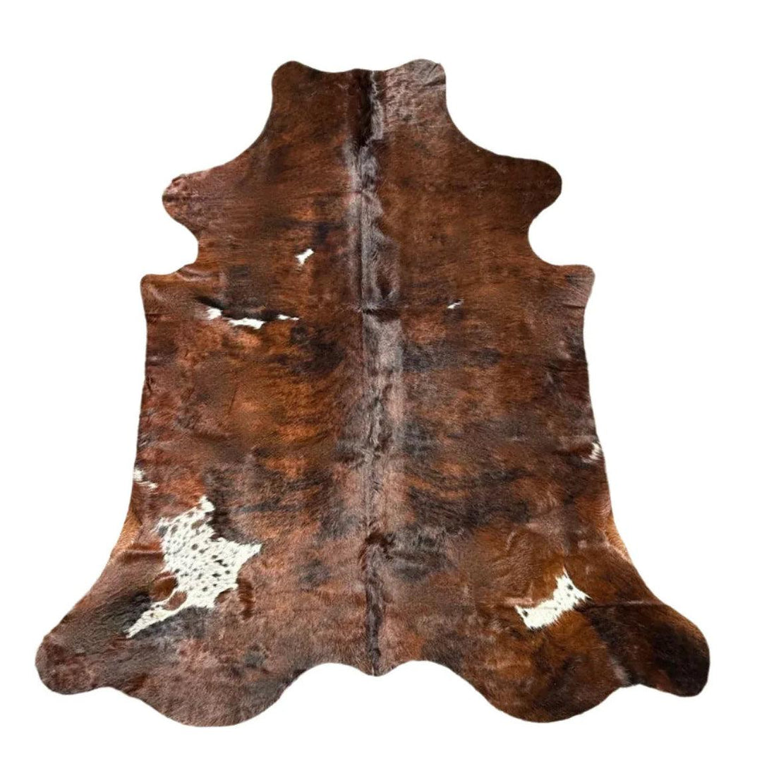 Premium Cowhide Rug from Cowhide Rugs London, showcasing natural cowhide pattern and texture in large size, 231cm by 191cm.