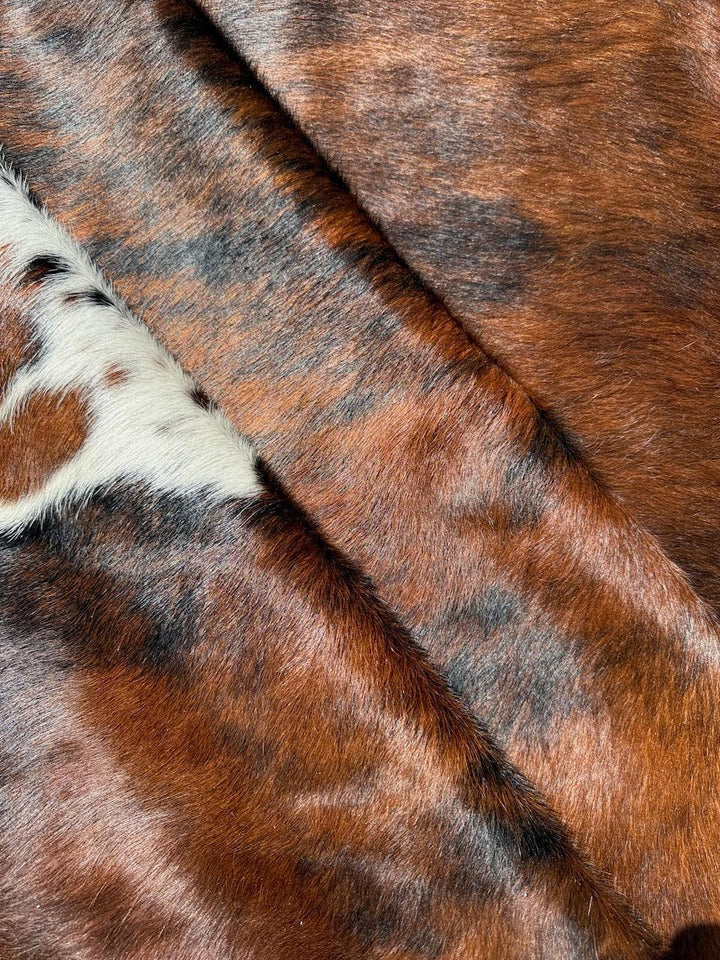 Premium Cowhide Rug from Cowhide Rugs London, large 231cm x 191cm natural cowhide with distinctive markings.