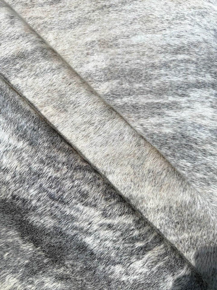 Premium Cowhide Rug by Cowhide Rugs London, 220cm x 210cm, natural cowhide with distinctive markings and soft texture.