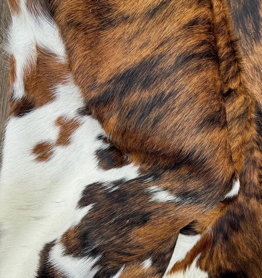 Premium Cowhide Rug from Cowhide Rugs London, 220cm x 195cm, natural cowhide with unique pattern and texture.