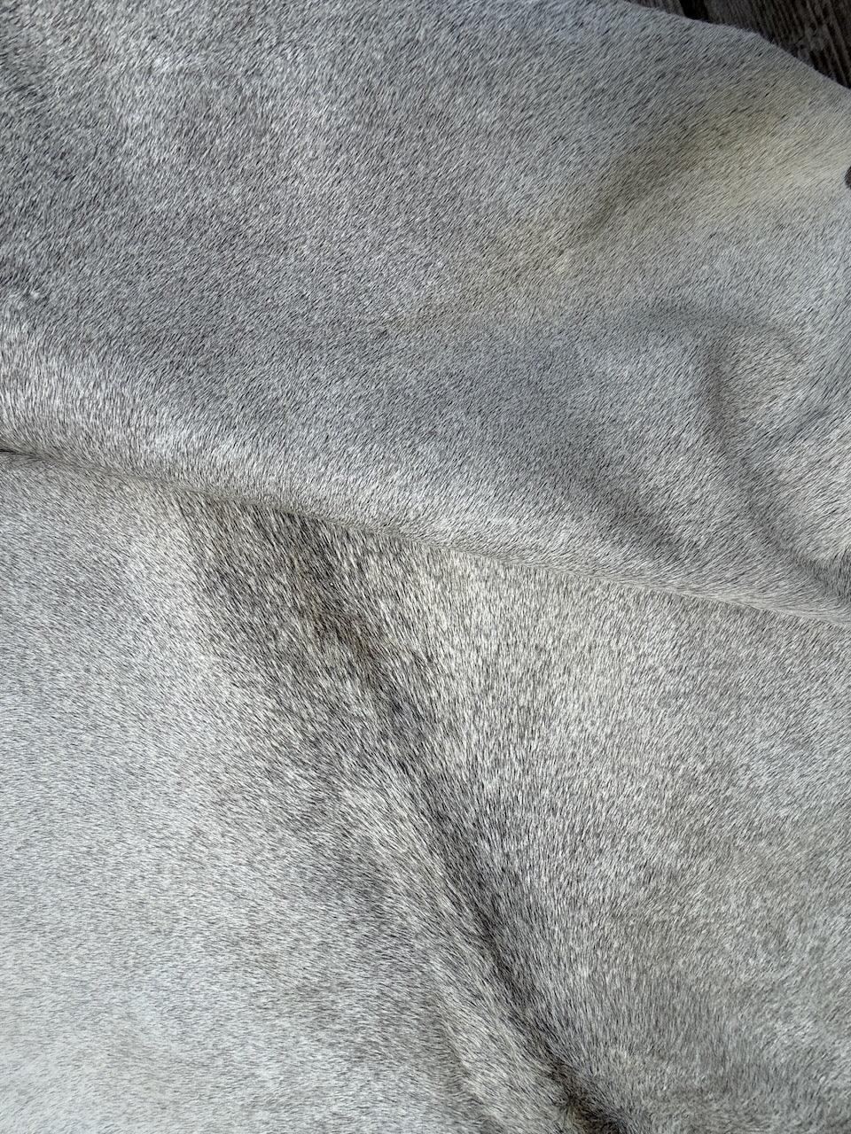 Premium Cowhide Rug by Cowhide Rugs London, natural cowhide with unique patterns, measuring 205cm by 187cm, over £200 collection.