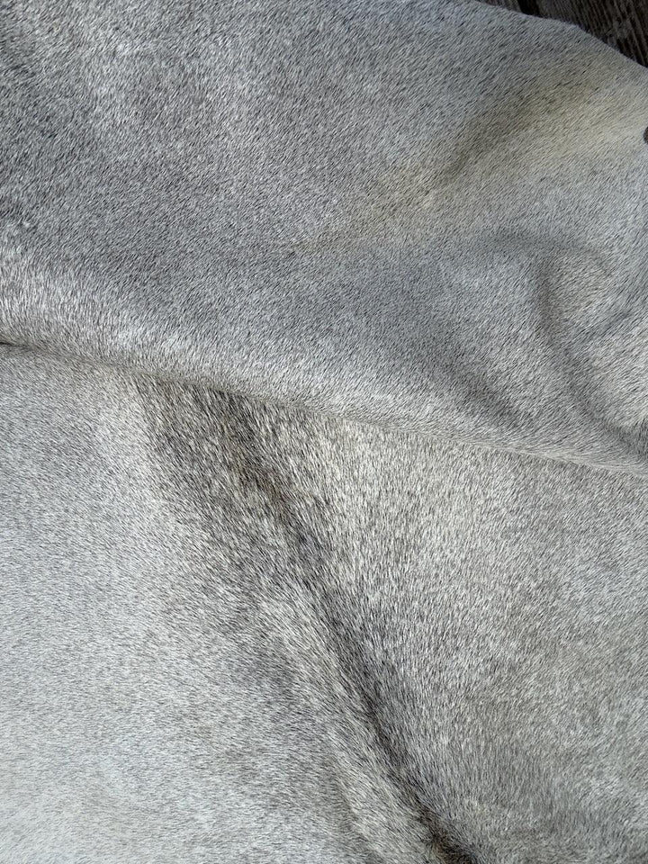 Premium Cowhide Rug by Cowhide Rugs London, natural cowhide with unique patterns, measuring 205cm by 187cm, over £200 collection.