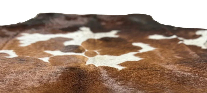 Premium Cowhide Rug by Cowhide Rugs London, 235cm x 200cm, natural cowhide with distinctive pattern and soft texture.