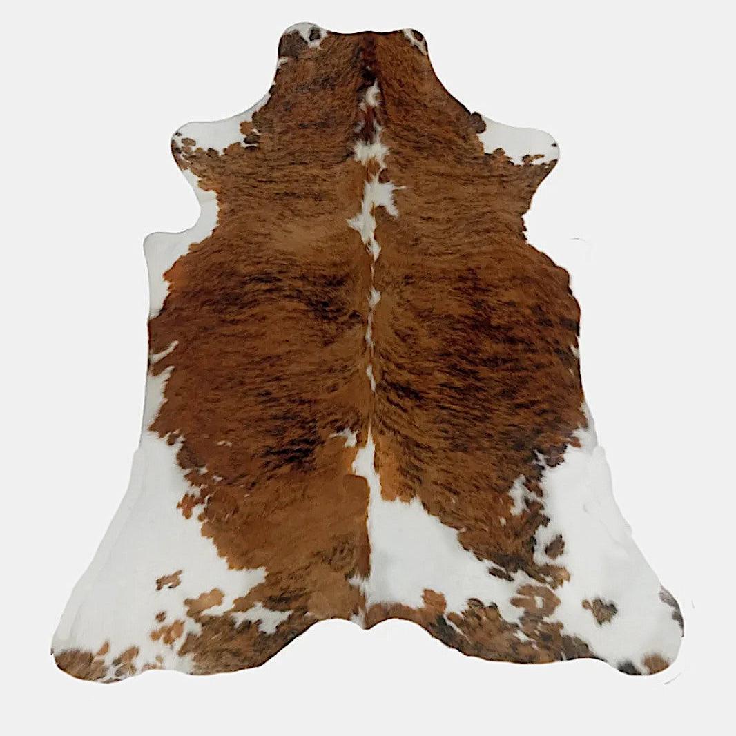 Premium Cowhide Rug from Cowhide Rugs London, 227cm x 198cm, natural cowhide with a unique pattern and soft texture.