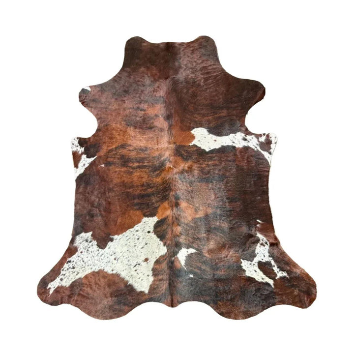 Premium cowhide rug from Cowhide Rugs London, 235cm x 199cm, natural cowhide with distinctive patterns and rich texture.