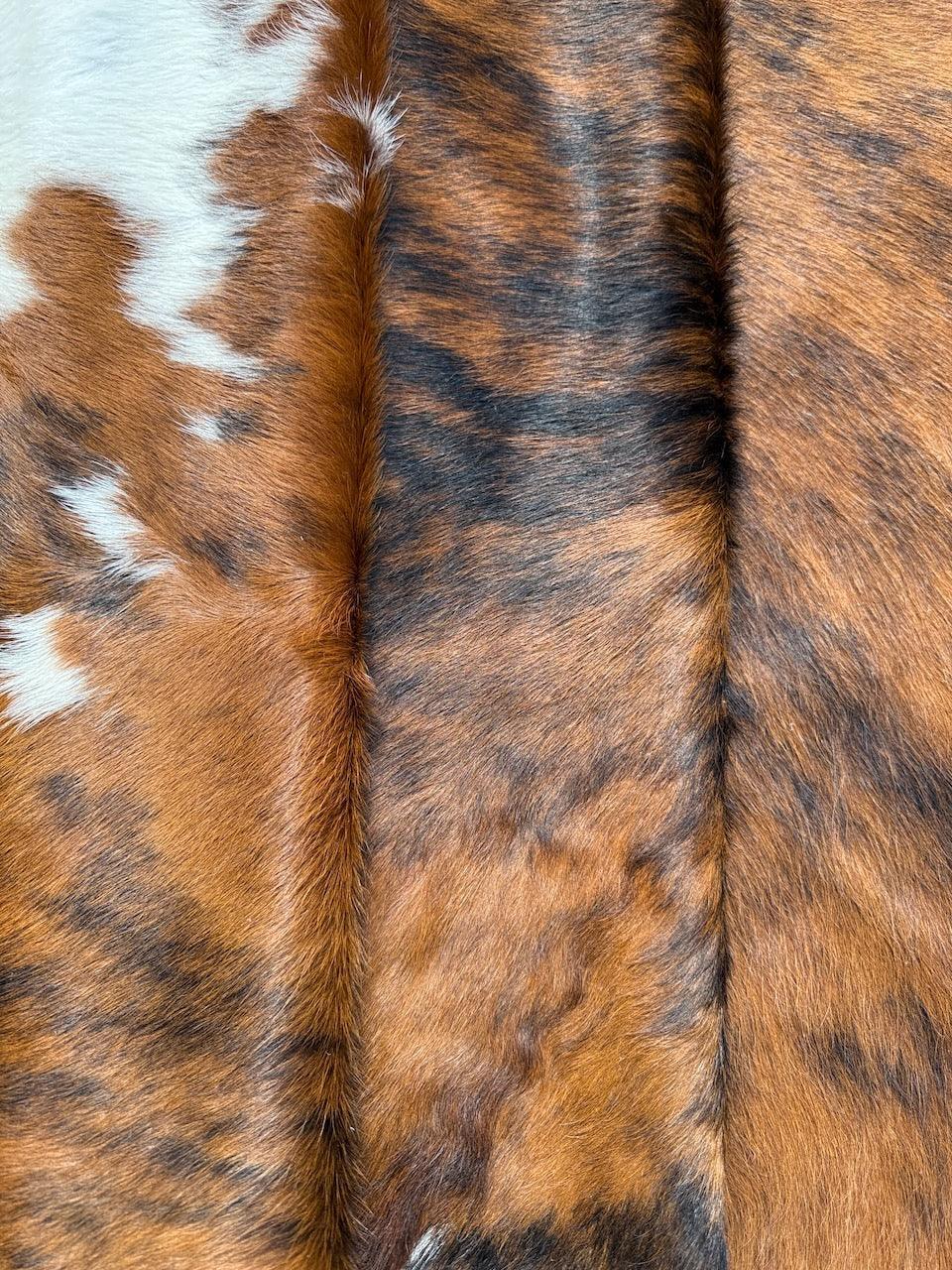 Premium Cowhide Rug by Cowhide Rugs London, 220cm x 194cm, natural cowhide with unique pattern and soft texture.