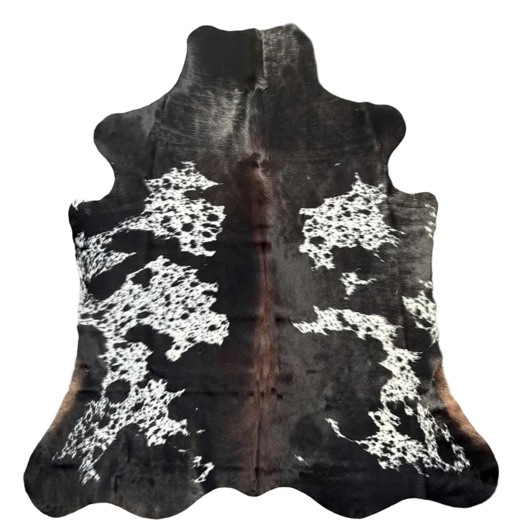 Premium cowhide rug from Cowhide Rugs London in natural brown and white tones, measuring 215cm by 192cm.