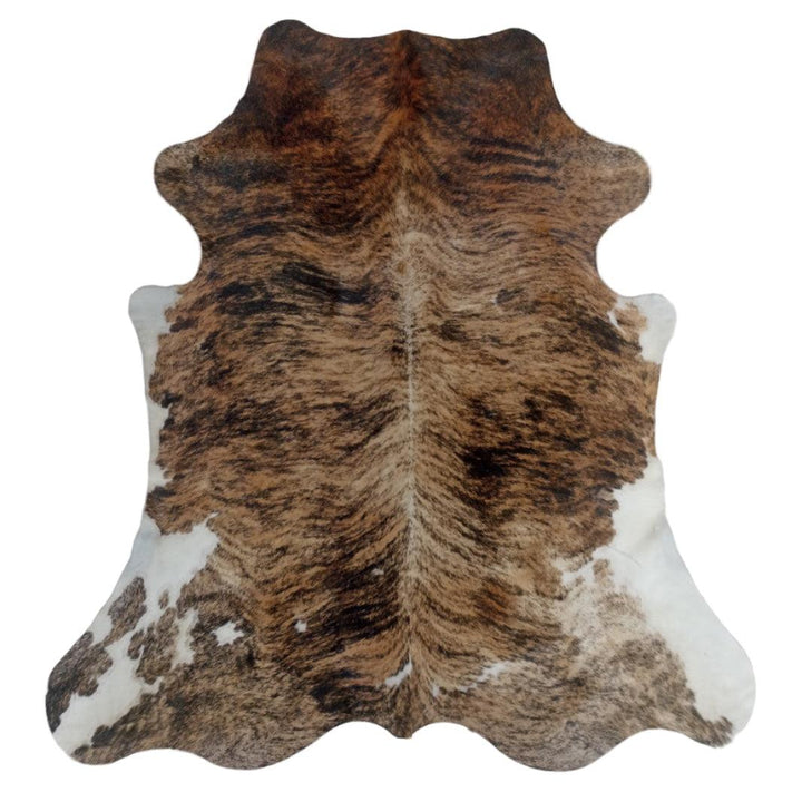 Premium cowhide rug from Cowhide Rugs London, XXL size 244cm x 200cm, featuring natural cowhide pattern and soft texture.