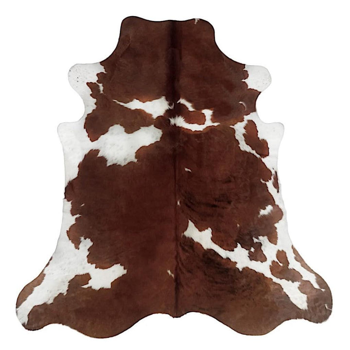 Premium cowhide rug by Cowhide Rugs London, large 224cm x 203cm, natural cowhide with distinctive markings and soft texture.