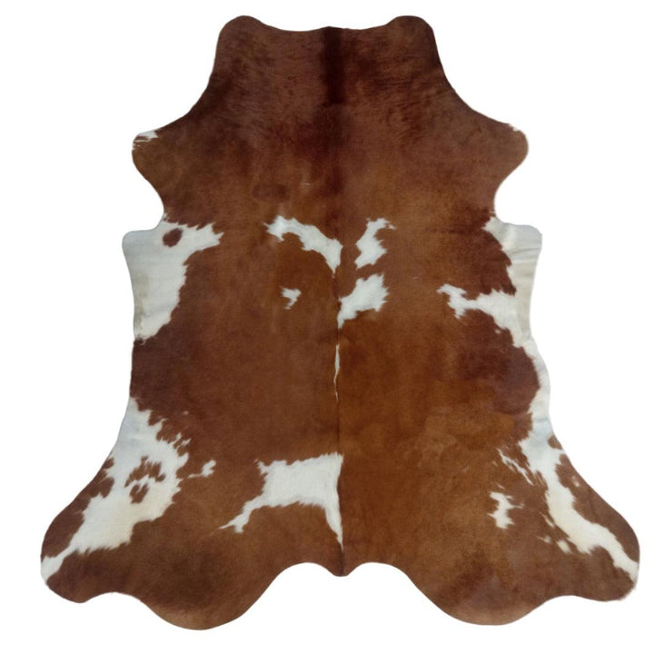 Premium cowhide rug by Cowhide Rugs London, large 210cm x 200cm, natural cowhide pattern, ideal for elegant home décor.