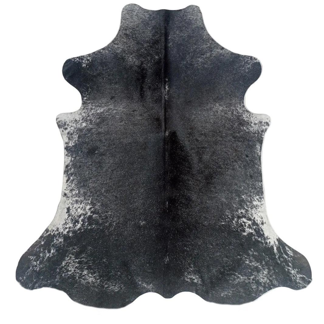 Premium cowhide rug by Cowhide Rugs London, XL size 225cm x 190cm, featuring natural cowhide with distinctive pattern and texture.
