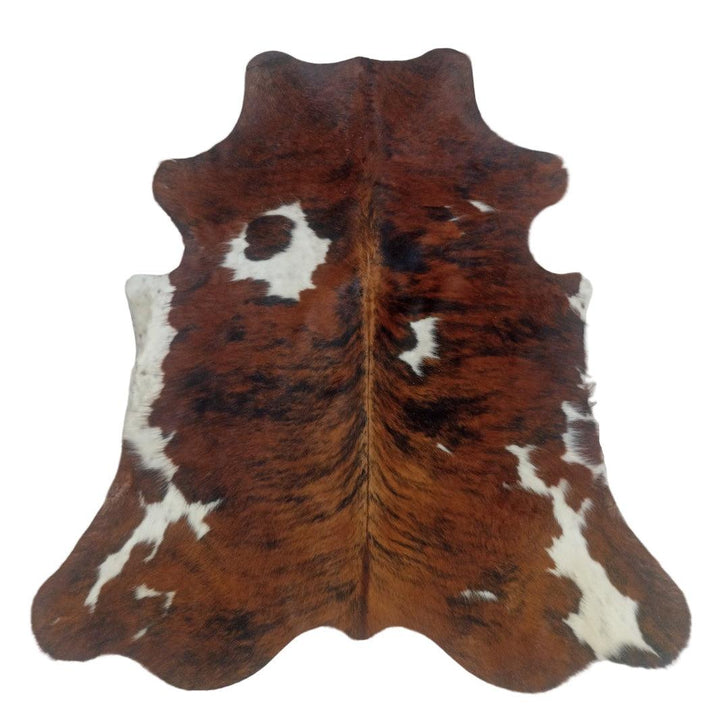 Premium cowhide rug by Cowhide Rugs London, 200cm x 178cm, natural brown and white cowhide pattern on plush leather.
