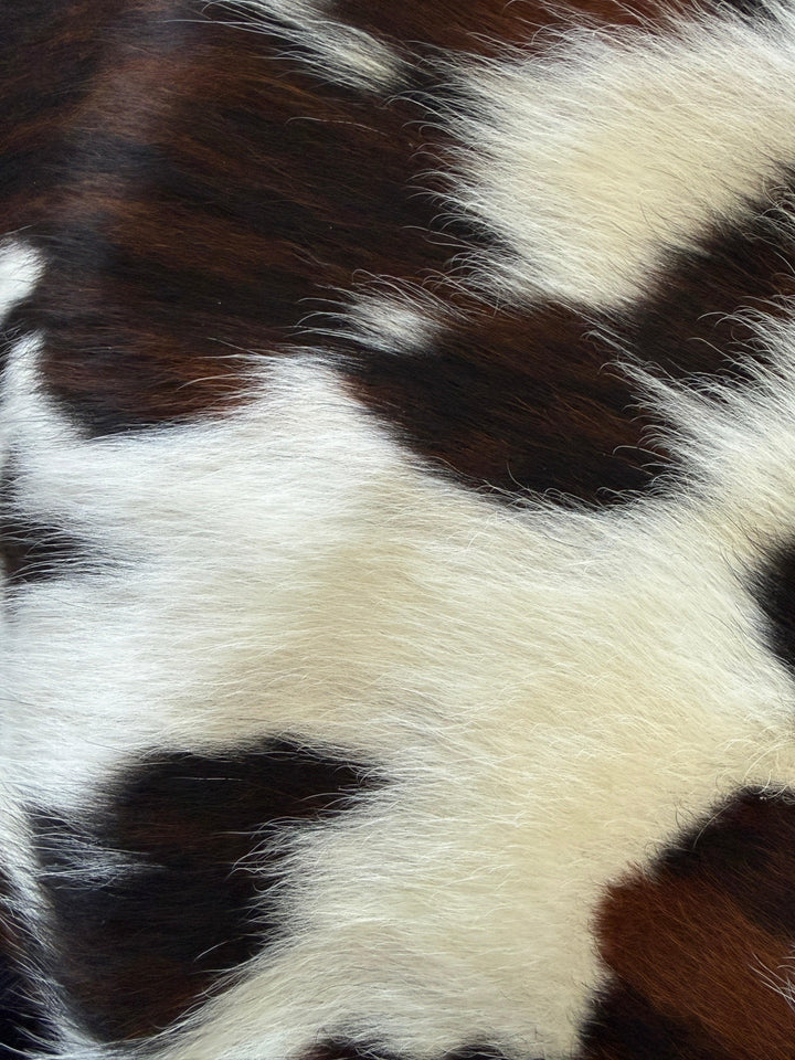 Premium Cowhide Rug by Cowhide Rugs London, 195cm x 181cm, natural cowhide with unique pattern and soft texture.