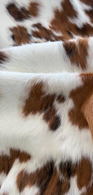 Premium Cowhide Rug by Cowhide Rugs London, large natural cowhide with distinctive markings, 214cm x 192cm.