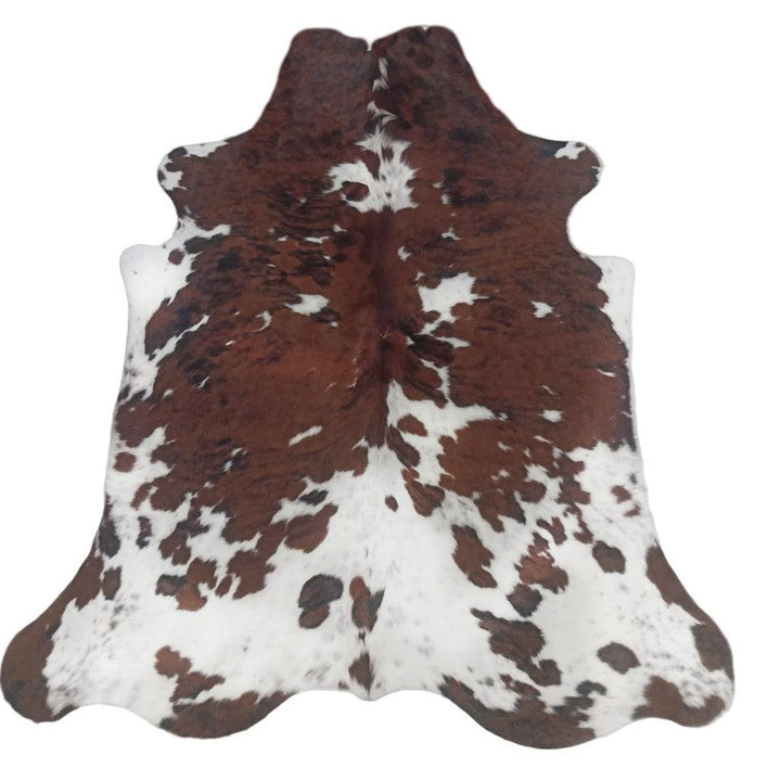 Premium cowhide rug from Cowhide Rugs London, 205cm x 181cm, natural cowhide with unique markings, ideal for stylish home decor.