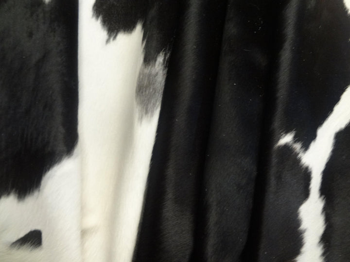 Premium Cowhide Rug by Cowhide Rugs London, 205cm x 180cm, natural cowhide with unique pattern and soft texture.