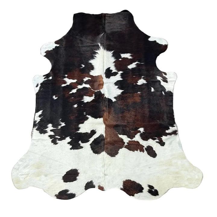 Premium cowhide rug by Cowhide-Rugs-London, 222cm x 182cm XL, natural cowhide with distinctive patterns and rich texture.