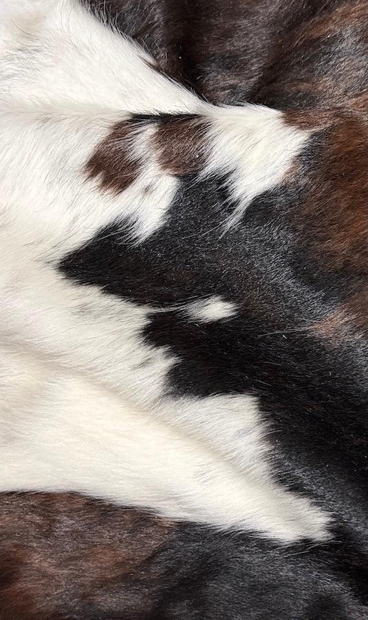 Premium Cowhide Rug from Cowhide Rugs London, XXL size 225cm x 208cm, showcasing natural cowhide pattern and texture.