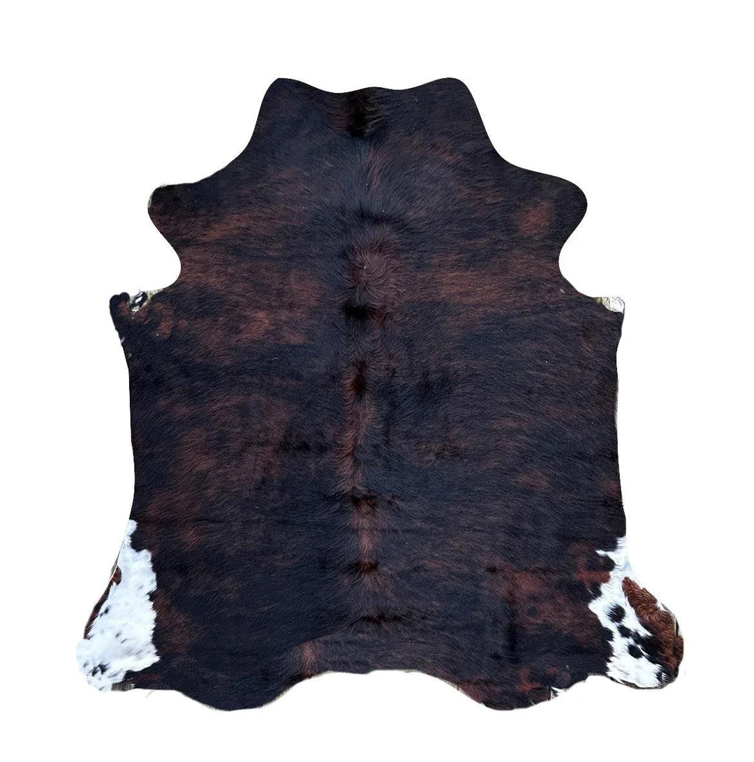 Cowhide Rug AS68 from Cowhide Rugs London, natural brown and white cowhide with 1.74m x 1.55m size, ideal for stylish home decor.