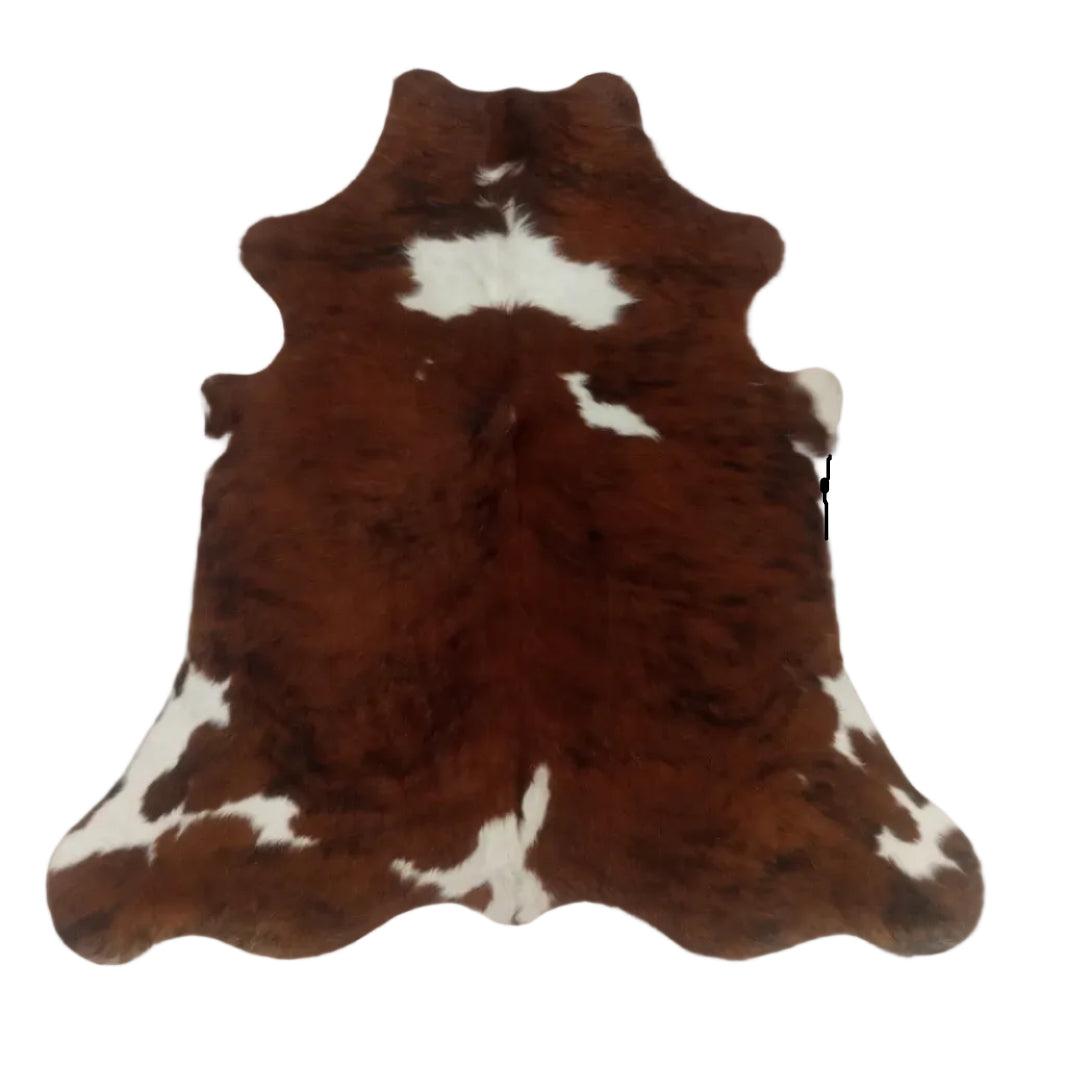 Cowhide Rug N45538 from Cowhide Rugs London, 1.80m x 1.67m, with natural brown and white patches on plush cowhide.