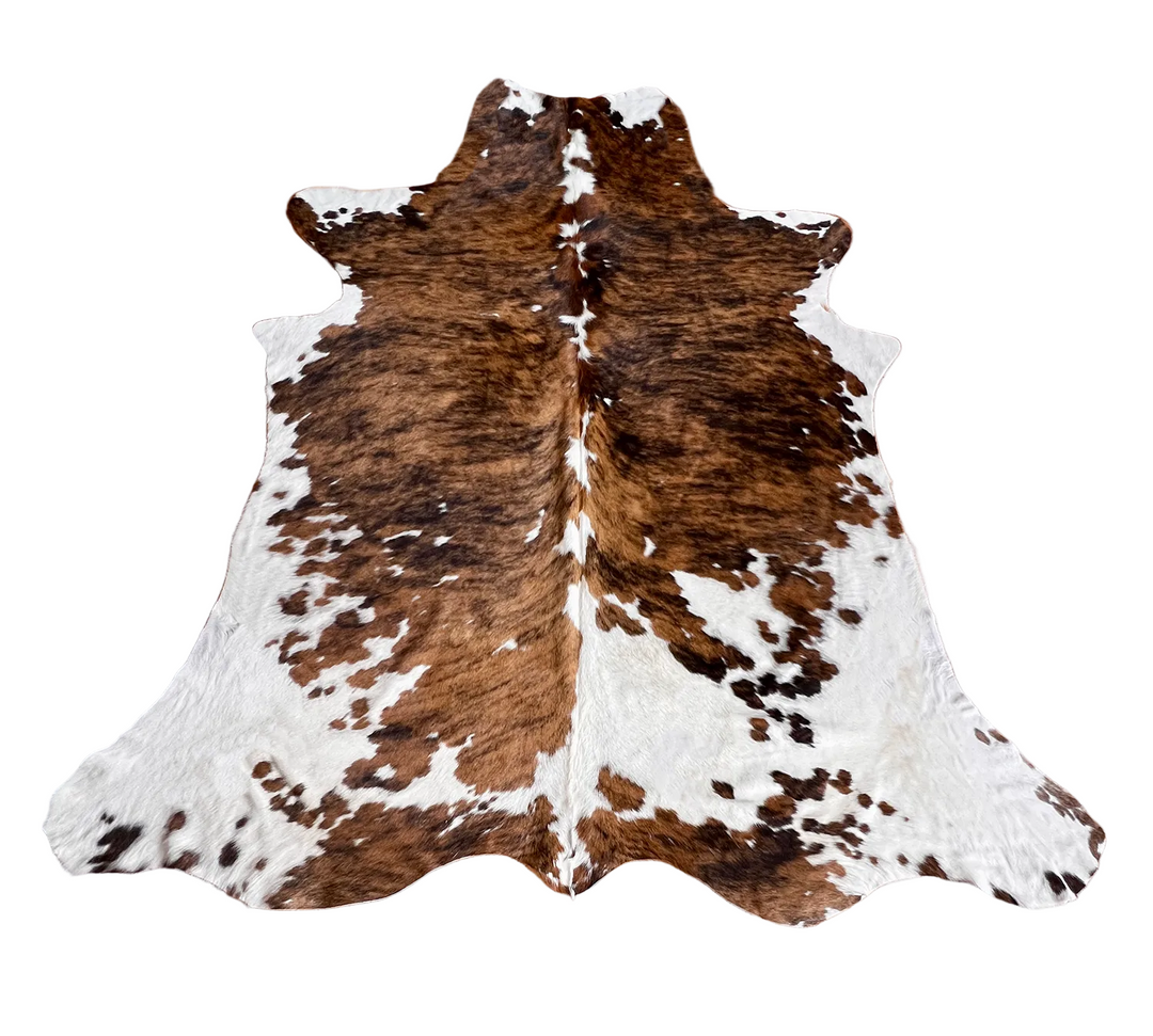 Large Cowhide Rug by Cowhide Rugs London, 217cm x 195cm, natural cowhide with distinctive markings and texture.