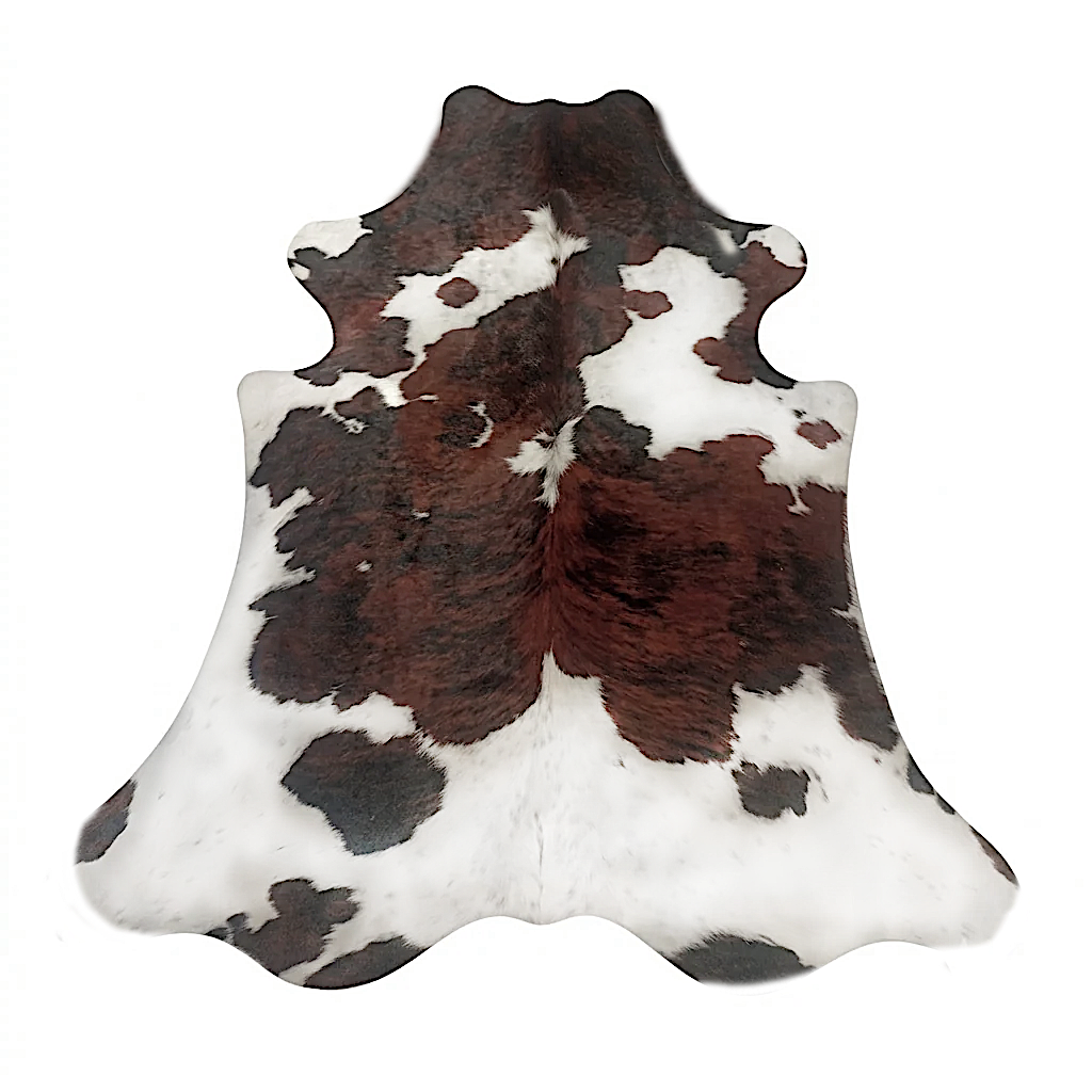 Brown and white cowhide rug on a white background
