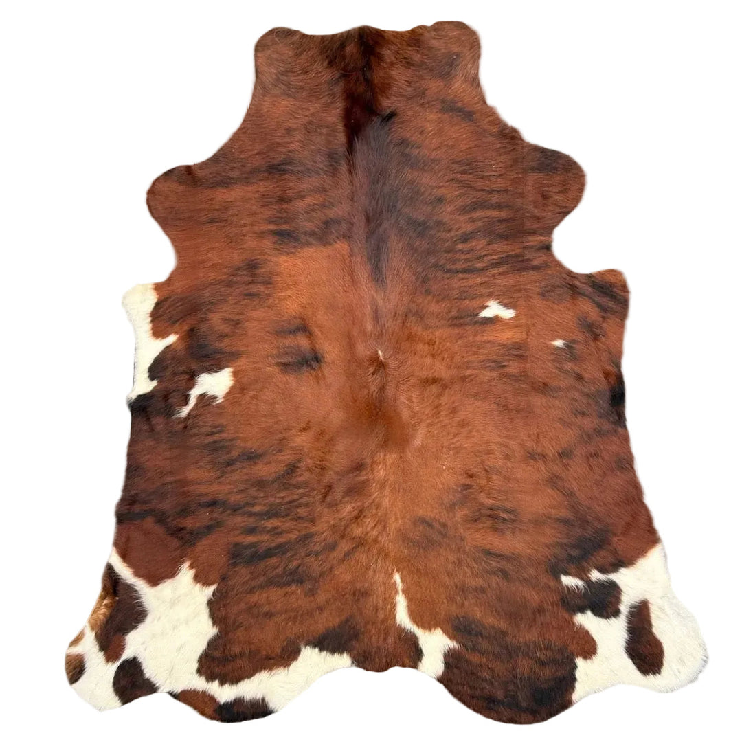 Brown and white cowhide rug l