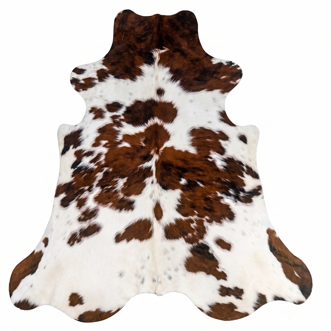 Brown and white cowhide rug with natural spotted pattern, shown flat against a white background.