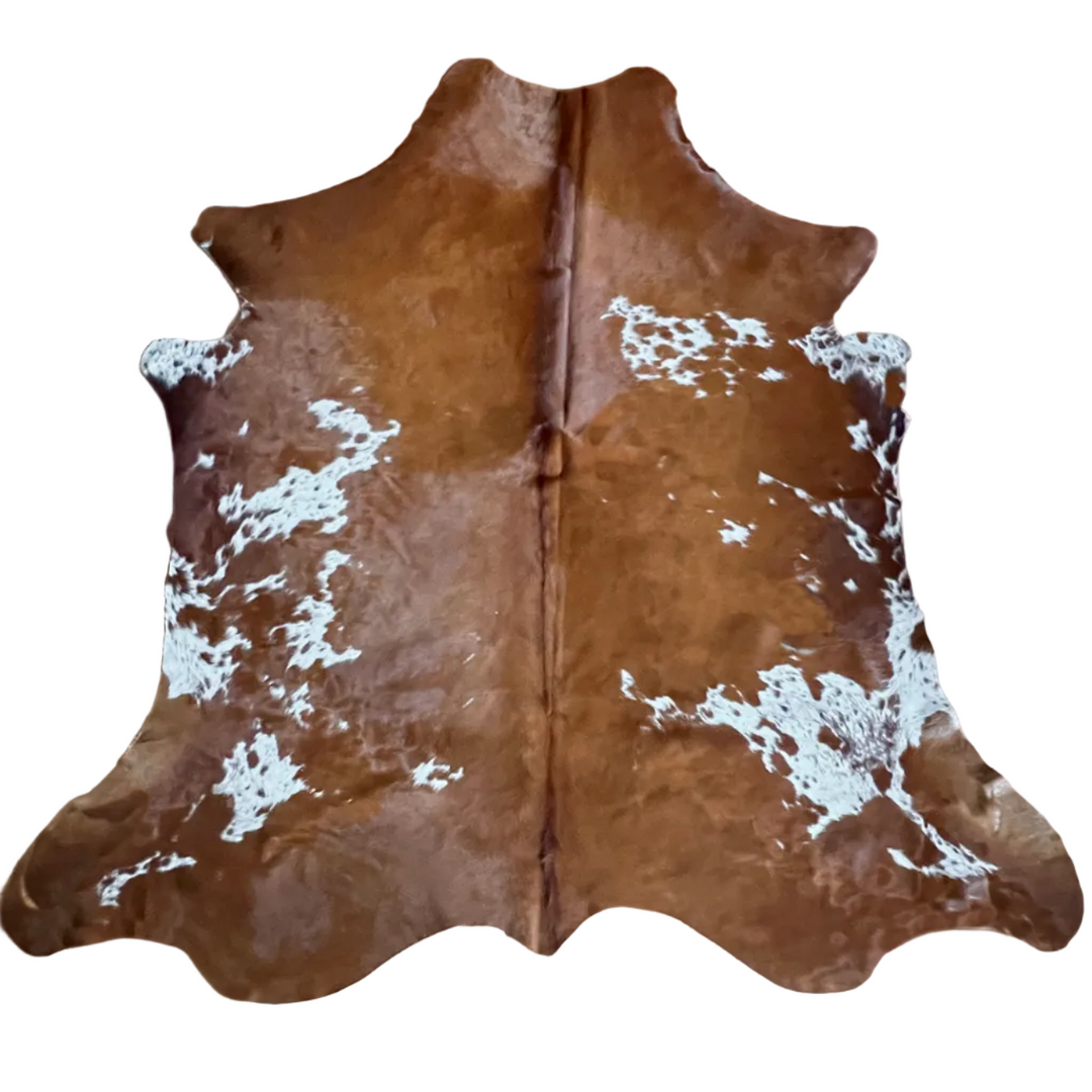Large cowhide rug from Cowhide Rugs London, 225cm x 210cm, natural brown and white cowhide pattern for stylish home decor.